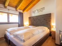 Łóżko lub łóżka w pokoju w obiekcie Apartment Lanner by Interhome