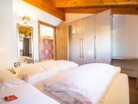 Łóżko lub łóżka w pokoju w obiekcie Apartment Lanner by Interhome