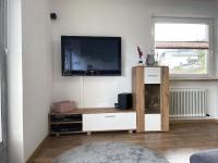 A television and/or entertainment centre at Ferienwohnung Sunhill