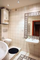 Kúpeľňa v ubytovaní Velvet Apartament Kopińska