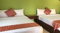 SANDY GARDEN RESORT LANGKAWIにあるベッド