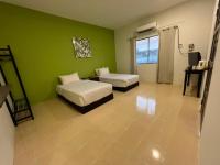 SANDY GARDEN RESORT LANGKAWIにあるベッド