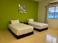 SANDY GARDEN RESORT LANGKAWIにあるベッド