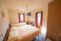Łóżko lub łóżka w pokoju w obiekcie Hotel Eira