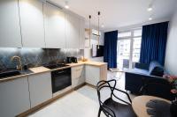 Kuchyňa alebo kuchynka v ubytovaní Apartament pod Szyndzielnią