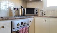 Kuchyň nebo kuchyňský kout v ubytování Petras Cozy Nest, 1-bedroom apt., Paphos-Universal