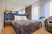 Posteľ alebo postele v izbe v ubytovaní InPoint Central Suites with Parking Available