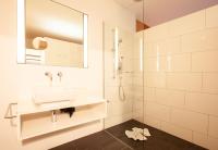 a bathroom with a sink and a shower at Bonawinkel NEU in Gaschurn