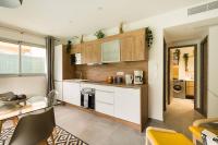 A kitchen or kitchenette at Stylish New 1 bedroom apartment in juan les pins