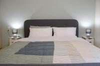 Posteľ alebo postele v izbe v ubytovaní Cozy modern apartment