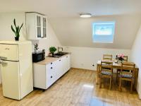 Kuchyň nebo kuchyňský kout v ubytování Apartmány Jetřichovice - České Švýcarsko
