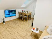 TV a/nebo společenská místnost v ubytování Apartmány Jetřichovice - České Švýcarsko