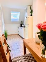 Kuchyň nebo kuchyňský kout v ubytování Apartmány Jetřichovice - České Švýcarsko
