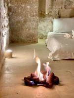 Posteľ alebo postele v izbe v ubytovaní La Cammara al Duomo Lecce Luxury Apartment