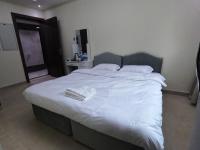 Barsha Star Residence - Home Stayにあるベッド