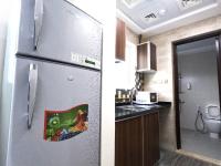Barsha Star Residence - Home Stayにあるキッチンまたは簡易キッチン