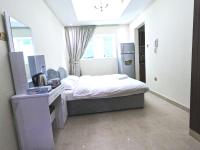 Barsha Star Residence - Home Stayにあるベッド