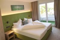 Posteľ alebo postele v izbe v ubytovaní Hotel Pachernighof