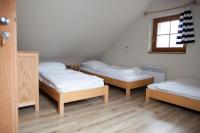 Postel nebo postele na pokoji v ubytování Penzion Krizky