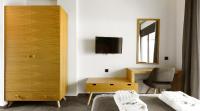 A television and/or entertainment centre at Botanica Luxury Suites