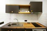 A kitchen or kitchenette at Botanica Luxury Suites