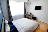 Postel nebo postele na pokoji v ubytování Апартамент Галерия Apartment Gallery