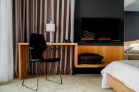 Postel nebo postele na pokoji v ubytování Hotel Osmolis