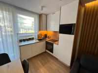 Kuchyňa alebo kuchynka v ubytovaní Apartament BD Premium III Klifowa