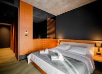 Postel nebo postele na pokoji v ubytování Hotel Osmolis