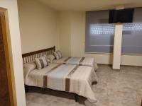 Postel nebo postele na pokoji v ubytování Hotel Novo