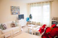 Telewizja i/lub zestaw kina domowego w obiekcie Azúr Apartman Keszthely
