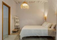 Postel nebo postele na pokoji v ubytování Casa Santiago House Boutique