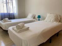 Postel nebo postele na pokoji v ubytování Villa Altea 2 pools - 24 persons
