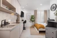 Televízia a/alebo spoločenská miestnosť v ubytovaní Molo Longo - Central Apartments & Rooms