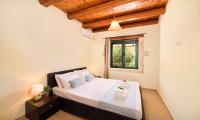 Posteľ alebo postele v izbe v ubytovaní Villa Stelios Private Pool