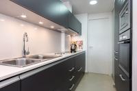 Kuchyň nebo kuchyňský kout v ubytování Apartamento Delfin
