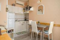 Kuchyňa alebo kuchynka v ubytovaní Apartment Home Sweet Home