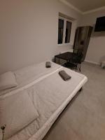 Postel nebo postele na pokoji v ubytování Mia Mia House