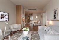 a living room with a couch and a table at Hotel Bellevue Dubrovnik in Dubrovnik
