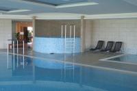 Bazén v ubytovaní Trixy wellness apartman Siófok alebo v jeho blízkosti