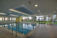 Bazén v ubytovaní Trixy wellness apartman Siófok alebo v jeho blízkosti