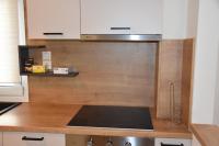 Kuchyňa alebo kuchynka v ubytovaní Comfy Central Apartment
