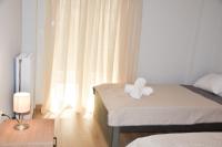 Posteľ alebo postele v izbe v ubytovaní Comfy Central Apartment