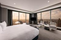 Meriton Suites World Tower, Sydneyにあるベッド