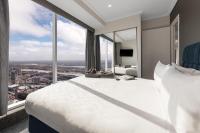 Meriton Suites World Tower, Sydneyにあるベッド