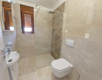 Koupelna v ubytování Villa Markulin, Šišan
