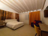 Łóżko lub łóżka w pokoju w obiekcie Hotel Luna