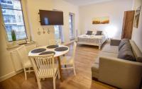 Posedenie v ubytovaní Apartamenty na Wyspie - Aquamarina - Budynek A - B - C