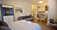 Kuchyňa alebo kuchynka v ubytovaní Apartamenty na Wyspie - Aquamarina - Budynek A - B - C