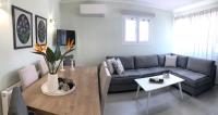 A seating area at Strelitzia Apartments
